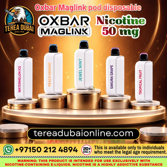 Oxbar Maglink Pod Disposable 50K Puffs 5% In UAE| Terea Dubai Online. Promotional graphic for OXBAR MAGLINK disposable pods, showing five white pod devices on a gold pedestal against a dark gold background. The pods are labeled with different flavors: Watermelon Ice, Peach Mango, Jewel Mint, Sandura Grape, and Tropical Fruit.